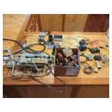 Box of Assorted Batteries, Chargers, and Power Cables