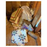 Assorted Quilts and Decorative Pillows