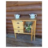 Wooden Side Table with Drawers and Floral Pitchers