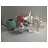 Assorted Decorative Items: Pitchers, Mug, Basket, Nativity Scene, and Lidded Jar