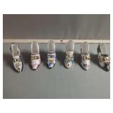 Six Porcelain Shoe Figurines