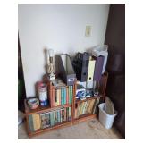 Shelf of Books, Lamp, and Household Items