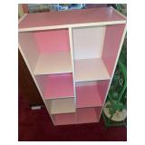Pink and White Shelving Unit