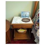 Wooden Nightstand with Decorative Items