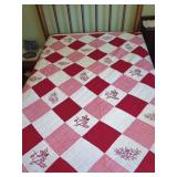 Red and White Embroidered Quilt