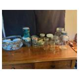 Collection of Glass Jars and Metal Basket