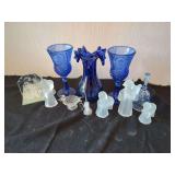 Collection of Blue and Clear Glassware Featuring Vases, Goblets, and Angel Figurines