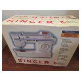 New in box Singer 15 Stitch Sewing Machine