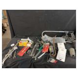 Tools and Accessories Including Wrenches, Screwdrivers, and Fishing Lures