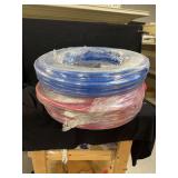 Coils of 1/2-Inch Plastic Tubing - Blue and Red