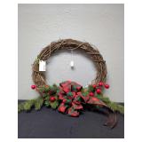 GRAPE VINE WREATH WITH RED AND GREEN PLAID BOW AND BIG RED BERRYS