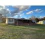 Absolute Online Auction of The Estate of Earl Clark's Doublewide Home and Approximately 5.73 Acres