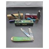Pocket Knives Including Whitetail Cutlery, Steel Warrior, and Uncle Lucky