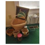 Household Items Including Baskets, Mirror, and Plant Holder