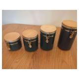 Four Graduated Ceramic Canisters