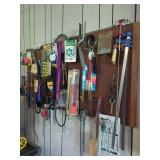 Assorted Hand Tools and Hardware on Pegboard