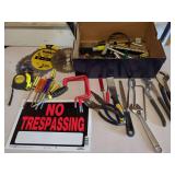 Hand Tools, Saw Blades and a No Trespassing Sign