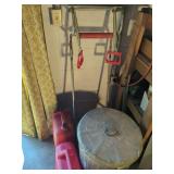 Exercise Equipment, Fuel Cans, Metal Trash Can and Filled Bag