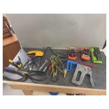 Tools and Equipment Including Multimeters, Step Drill Bit, and Clamps