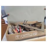 Assorted Hand Tools Including Sedy Wire Strippers, Chisels, Wrenches, Level, and Saw Chain