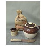 Stoneware Pottery Jar, Measuring Cups, Peanut Sack, and Knife