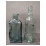 Two Decorative Glass Bottles