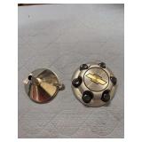 METAL FUNNEL AND A PLASTIC CHEVY HUB CAP