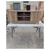 FARMHOUSE FLUTED TV STAND WITH 2 DOORS AND SHELVES - DOES HAVE SOME DAMAGE ON BACK BOTTOM AND INSIDE OF TOP - 59X16X25