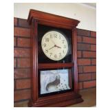 Wood Framed Clock with Relief Sculpture
