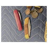 Pocket Knife Assortment Featuring U.S. Capitol and Elvis Presley Examples