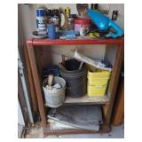 Contents of Cabinet with Vacuums, Buckets, and Tools