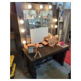 Vanity Table with Integrated Lighting and Assorted Contents