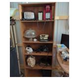 Kitchen Appliances and Household Items on Shelving Unit