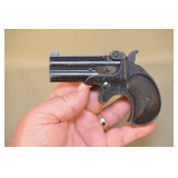 RG Model 15 2-Shot Derringer That Shoots .22 Short, Long, Or Long Rifle,
