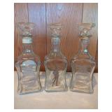 Set of Three Glass Bourbon Decanters with Stoppers
