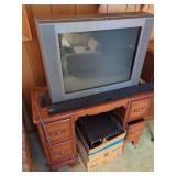 Sony Trinitron Television with Samsung Soundbar and Subwoofer