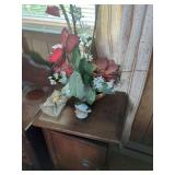 Wooden Cabinet with Assorted Decorative Items and Periodicals