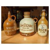 Three Ceramic Beverage Vessels: Jim Beam, White Lightning, and Fiedlers Bock