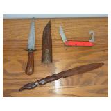 Assorted Cutlery Collection Including Fixed Blade Knife, Folding Multi-Tool, and Carved Letter Opener