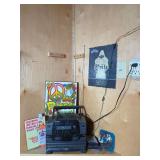 Koss Portable Stereo System with Assorted Promotional Signage and Media
