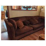 Brown Upholstered Three-Seater Sofa