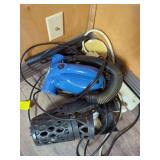 Shark Handheld Vacuum and Belkin Surge Protector