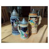 Three German Ceramic Beer Steins with Metal Lids