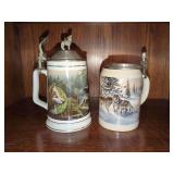 Two Decorative Ceramic Beer Steins with Wolf Imagery
