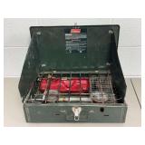 Coleman Green Metal Camp Stove with Red Fuel Tank