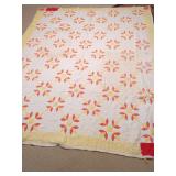 Pieced Cotton Quilt with Floral and Geometric Pattern