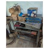 Metal Shelving Unit with Assorted Hardware and Storage Cases