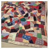 Crazy Quilt with Multi-Fabric Patchwork and Decorative Embroidery