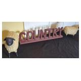 Decorative Sheep Figures and Country Signage