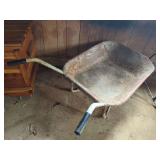 Metal Wheelbarrow with Red Tray and Single Wheel
